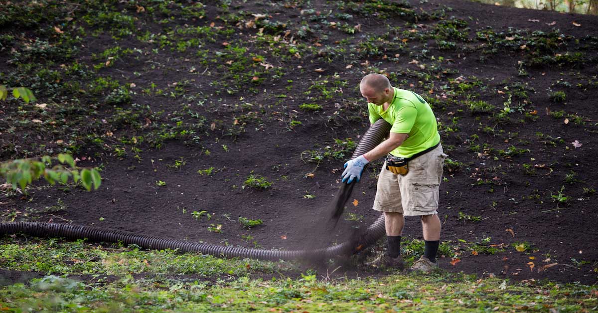 Man terraseeding lawn